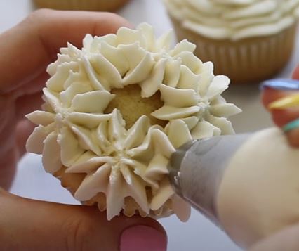 Add flowers around the edge of the cupcake